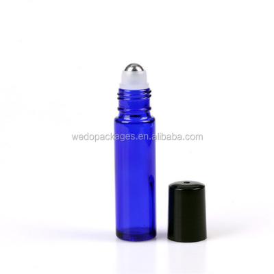 China Personal Care Luxury 10ml Blue Glass Roll On Bottle With Steel Ball For Perfume for sale