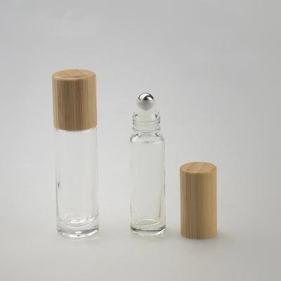 China Personal Care 10ml 15ml Clear Glass Bottle Stainless Steel Roll Ball Roll On Bottle With Bamboo Top Lip for sale