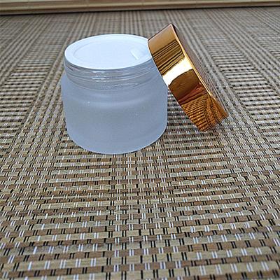 China Skin Care Surface 50gram Cream Jar 50ml Clear Frosted Glass Facial Cosmetic Cream Jar With Gold Lip for sale