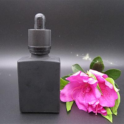 China Personal Care 30ml Rectangular Matte Black Dropper Bottle 1OZ Argan Oil E Juice Serum Glass Bottle for sale