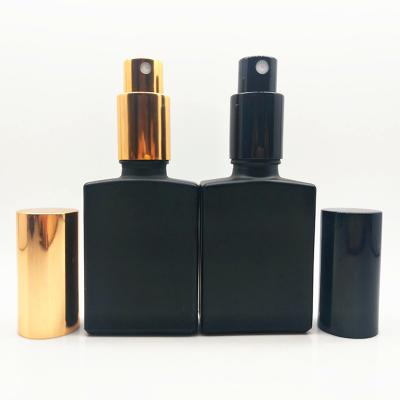 China Personal Care Matte Perfume Bottle 30ml Black Square Body Spray Glass Bottle With Aluminum Mist Spray Lid for sale