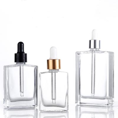 China Custom Printing 30ml 50ml 100ml Square Glass Personal Care Perfume Bottle Rectangle Serum Bottle With Dropper Lid for sale