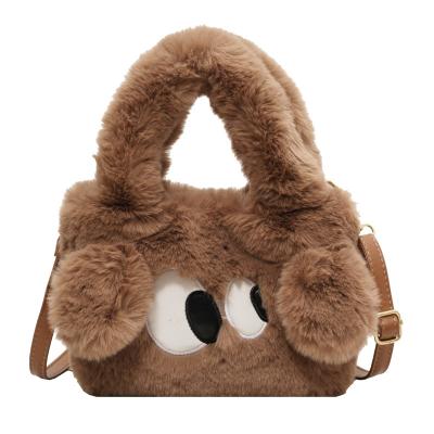 China Motion Detection Autumn Cartoon Cute Big Eyed Dog Handbag One Shoulder Crossbody Bag Plush Small Square Bag for sale