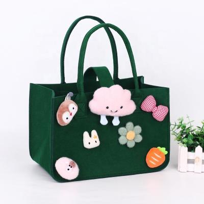 China Comic Durable Non-woven Storage Bag Felt Double Handle Opening Shopping Bag Cartoon Felt Female Handbag Storage Bag for sale