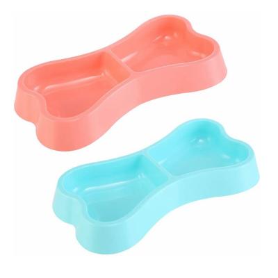 China Sustainable Bright Color Dog Double Rolls Feeder Plastic Dog Food Water Puppy Bone Shape Feeding Bowl For Cats And Puppy Pet Supplies for sale