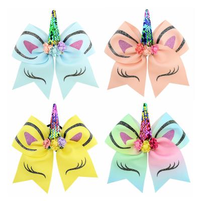 China Hot Selling Decoration Kids Unicorn Hair Clips Horns Bronzing Flip Sequins Bow Hair Tie for sale