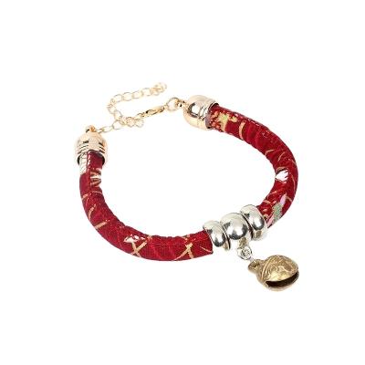 China Quick Release Style Ethnic Hand Make Pet Collar Cute Lucky Neck Circle With Bell For Pet Collar Whole Sale for sale