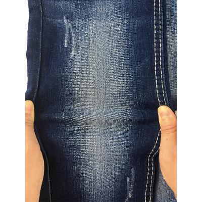 China Wholesale Price Stock Breathable Stretch Ribbed Twill Woven Raw Jeans Denim Fabric For Pants 12 Oz for sale