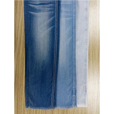 China Denim fabric supplier breathable premium jeans fabric ten cel denim mill rolls for sale