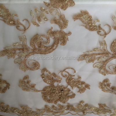 China 2015 viable fancy gold mesh embroidery fabric for wedding dress lace with beads heavy order for sale