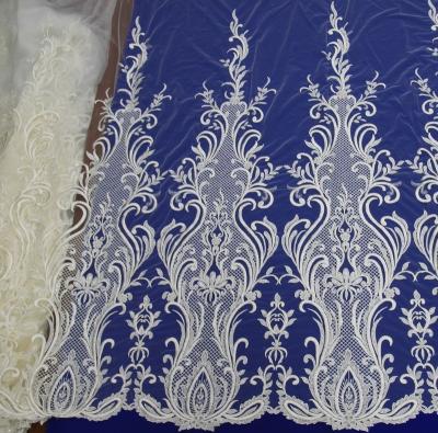 China 2020 newest handmade lace fabric with stone for wedding dress in stock for sale