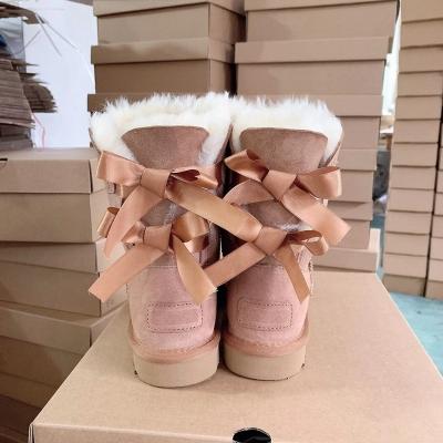 China Factory Direct Wholesale Breathable Winter Sheepskin Fur Warm Boots Waterproof Furry Uggh Snow Boots For Women for sale