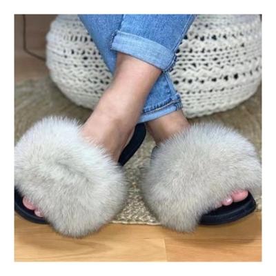 China 2021 Fashion Trend Designer Fashion Women Soft Fluffy Real Fur Slides for sale