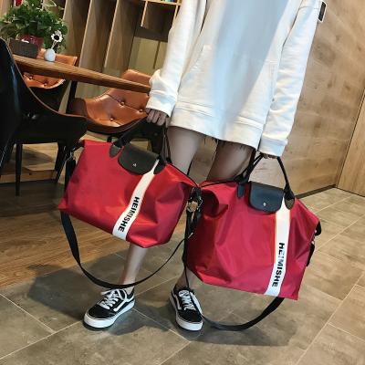 China Lady 2021 Outdoor Nylon Fashion Fitness Women Sports Travel Bag Duffle Bag Storage Hand Luggage for sale