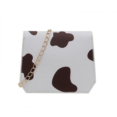 China 2021 High Quality New Design Fashion Mini Cow Pattern PU Leather Shoulder Messenger Bag For Women Kids for sale