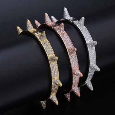 China Hip Hop Hip Hop Bling Bling Jewelry Iced Out Zircon Spikes Rivet Cone Stud Cuff Twist Thorns Bangles Bracelets for sale