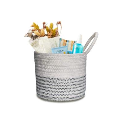 China Sustainable Kitchen Storage Baskets Cotton Rope Wall Basket Hanging Woven Wall Storage Basket for sale