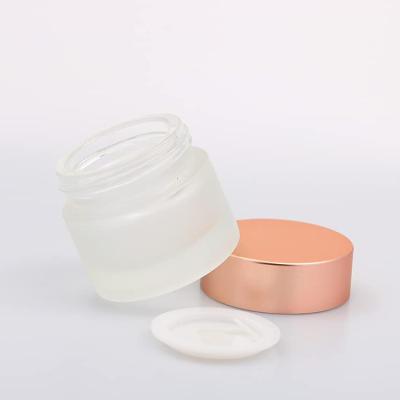 China Pink Color Frosted Glass Cosmetic Container Glass Cream Jar With Aluminum Lid for sale