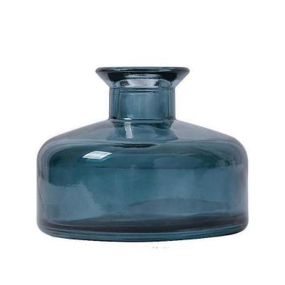 China Transparent Blue Coated Household Products Reeds Diffuser Glass Bottle With Cork for sale