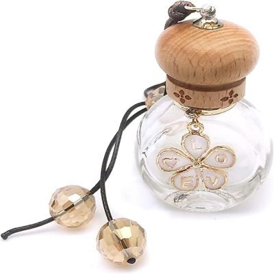 China New Arrival Cosmetic Car Perfume Aroma Diffuser Hanging Glass Bottle For Car for sale