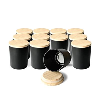 China Cosmetic Black White Glass Candle Jar Color Glass Candle Holder With Wooden Lid for sale