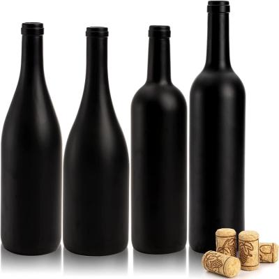 China Custom Beverage Logo Cylindrical Shape Empty Black 750ml Matte Coated Glass Wine Bottle With Wood Stopper for sale