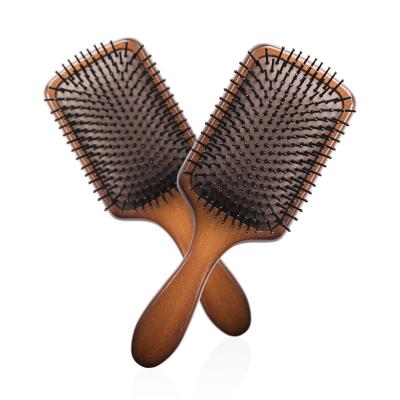 China Custom Logo Nondisposable Hot Selling Eco-friendly Massage Paddle Pad Brush Detangling Hair Brush for sale