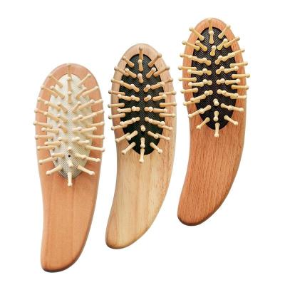 China Home Wholesale Custom Logo Natural Wood Paddle Scalp Massage Portable Hair Brush for sale