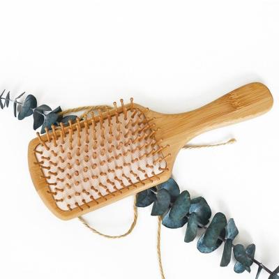 China Natural Bamboo Paddle Dropshipping Handle Scalp Massage Long Sweep Detangling Hair Bamboo Paddle Brush for sale