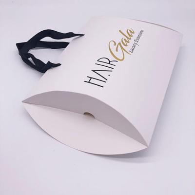 China Wholesale Custom Recycled Materials Hair Extension Pillow Box Hair Extension Packaging Pillow Box With Ribbon Handle for sale