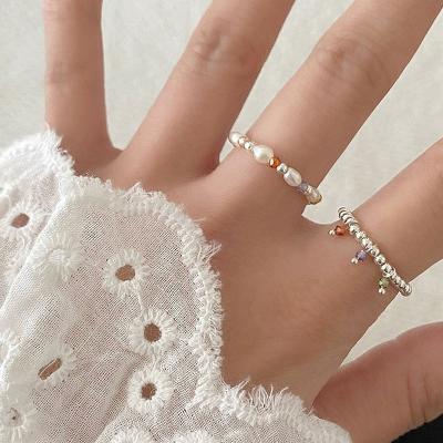 China Fashionable Jewelry Wholesale Luxury Pearl Beads Elastic Rope Rings For Women Adjustable Rings for sale