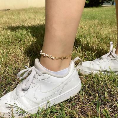 China FASHIONABLE European and American fashion minimalist personality pearl string metal cross chain anklet white foot ornaments for sale