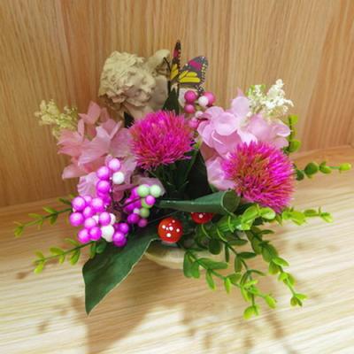 China Shop Eco-Friendly Home Decoration Garden Hotel Artificial Flower Vivid Plant With Resin Angel Pot Craft for sale