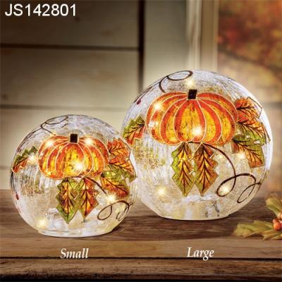 China Europe Pumpkin Pattern Ice Snowball Halloween Home Decorative Ornament Led Crack Glass Ball Ornament for sale