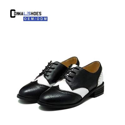 China Breathable Connal Kids Classic European Style Black And White Buckle Brogues Shoes for sale