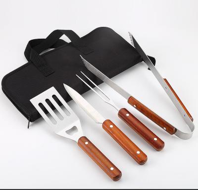 China Adjustable Height 4 Piece BBQ Tool Kit With Wooden Handles Metal Grilling Skewer Set for sale