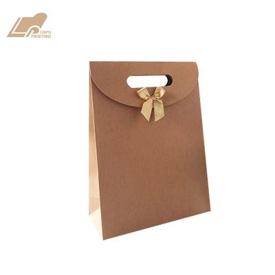 China High Grade Recycled Materials Bow Gift Paper Bags Wedding Business Valentine's Day Gift Special Paper Bag for sale