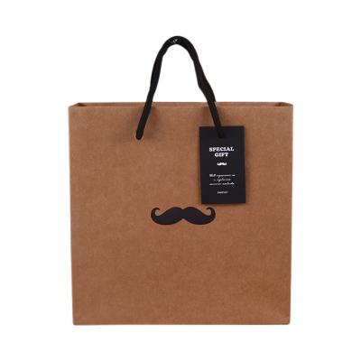 China Recycled Materials Recycled Kraft Paper Shopping Gift Bag Custom Printed With Handle for sale