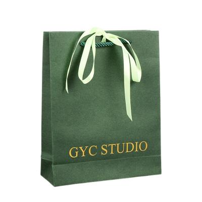 China Recycled Materials Colorful Printed Gift Shopping Paper Bag With Foil Stamping And Ribbon Handle for sale