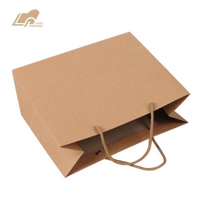 China Recycled Recycled Eco Friendly Materials Paper Bag Packaging Gift Bag White Black Packaging Bag for sale