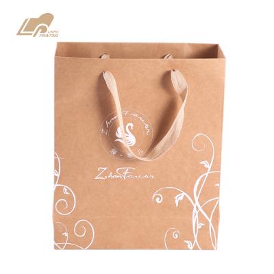 China Recycled White Custom Printing Materials Kraft Paper Bag Recyclable Gift Packaging Bag for sale