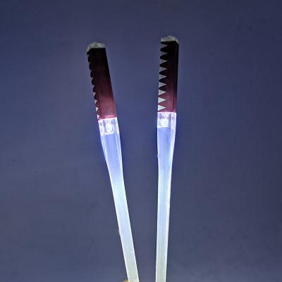 China 2022 Lightsaber Christmas Gifts Light up Mini Light Saber Chop Sticks for Qatar World Cup for sale