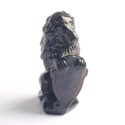 China China Folk Crafts Black Obsidian Animal Natural Crystal Carving Crystal Lion for sale