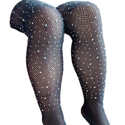 China Breathable diamond socks kids fishnet tights fishne girl tights fashion hollow out  net stockings for children for sale