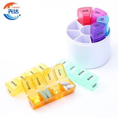 China Eco-friendly Cylindrical Pill Organizer 28Lattice Weekly Pill Box 4 Times A Day With Large Compartments Weekly Pill Box With Outer Case for sale