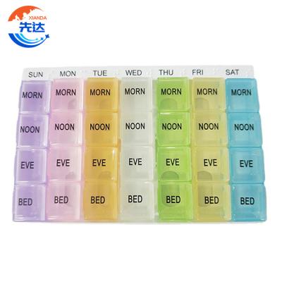 China Eco-friendly Weekly Pill Organizer Multicolor Pill Box 7 Day Medicine Tablets Holder Pill Organizer 28 Compartments Plastic Pill Box for sale