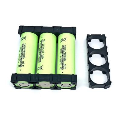 China Used in various battery packs wholesale 21700 battery spacer 1x3 battery spacer 21700 black holder battery cell holder for sale