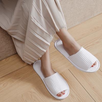 China Hotel/Travel/Waffle Splippers Disposable Washable Waffle Waffle Wholesale Indoor Customized Indoor Home Hotel Disposable Slippers for sale