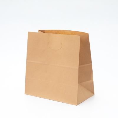 China Recyclable Die Cut Handle Custom Paper Bags Brown Takeout Food Kraft Packaging Flat Square Bottom Kraft Paper Bags for sale