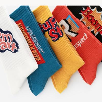 China Novelty Men's Unisex Combed Cotton Anti-Fault 70's Sport Art Letter Graffiti Print New Design Socks for sale